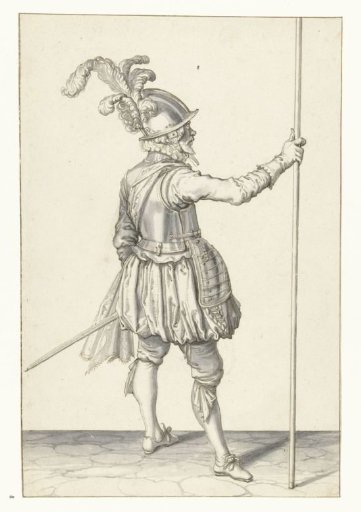 Soldier, seen from the back, holding his spear upright with his right hand