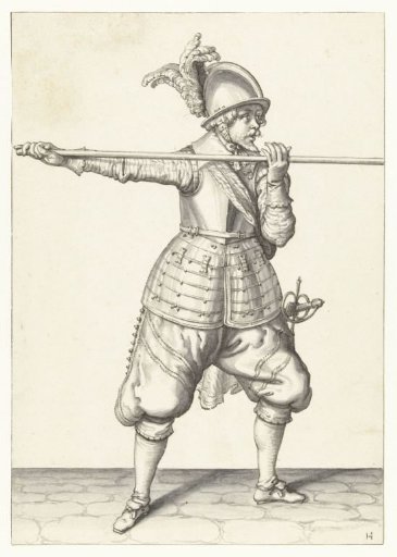 Soldier carrying his spear horizontally at shoulder height with both hands, his right hand at the butt of the weapon