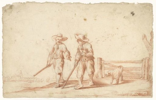 Two boys walking on a path near a fence
