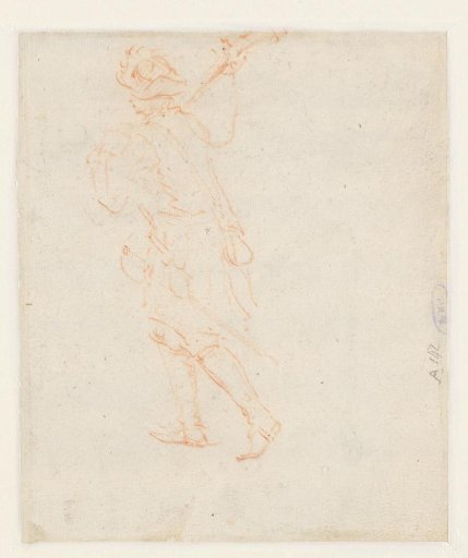 Soldier walking with a rifle over his shoulder