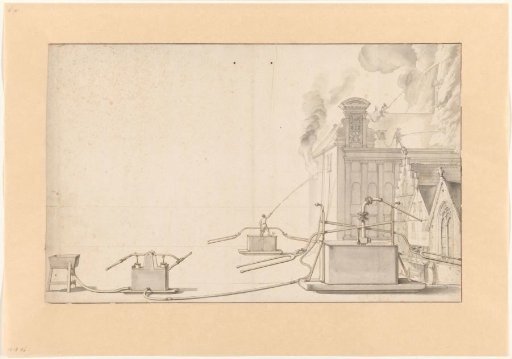 Three fire engines and a burning building