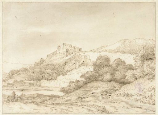 Mountainous landscape with a castle on a hill