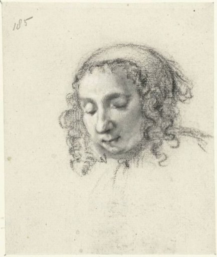 Head of a young woman with curly hair