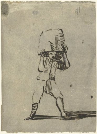 Boy with an inverted basket on his head