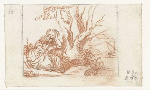 Woman sitting by a tree