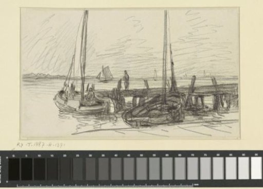 Two fishing boats at a wooden pier where a man stands