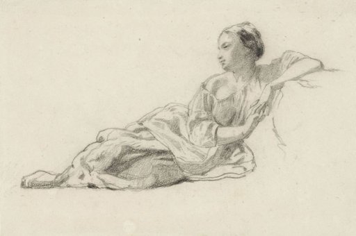 Young woman sitting on the ground