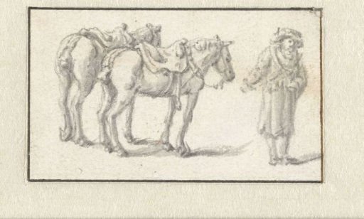 Man standing next to two horses