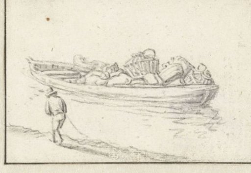 Laden boat and a man along the quay
