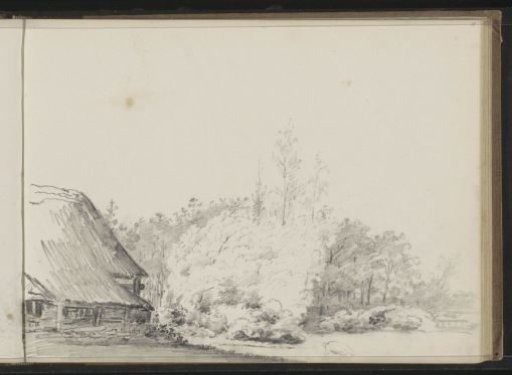Farmhouse at the edge of a forest