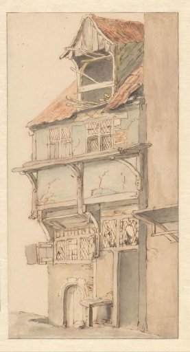 Facade of a corner house with an open dormer window