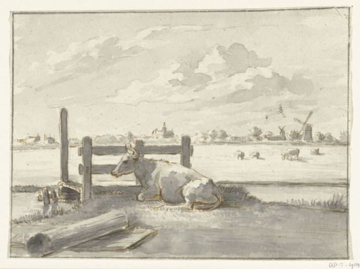 Meadow with a cow lying in the foreground