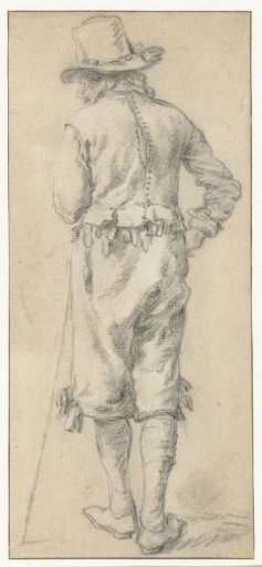 Standing young man, seen from the back