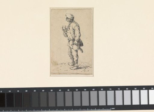 Standing man with glass and jug