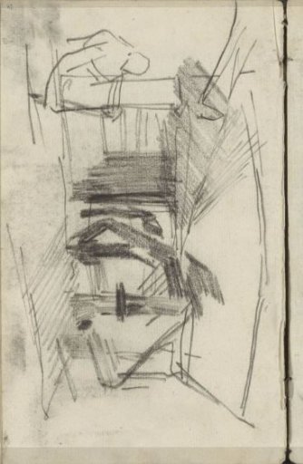 Figure, possibly near a farm or barn
