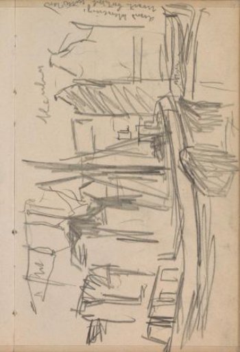 View of the Damrak in Amsterdam with boats
