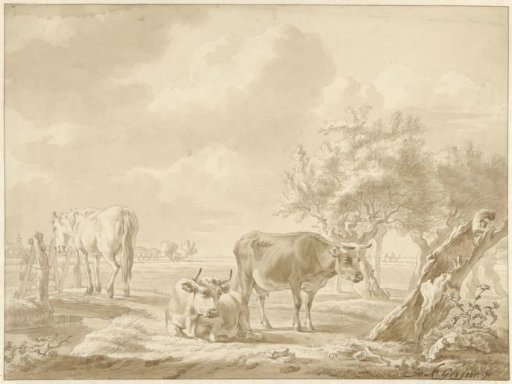 Two cows and a horse in a meadow with pollard willows