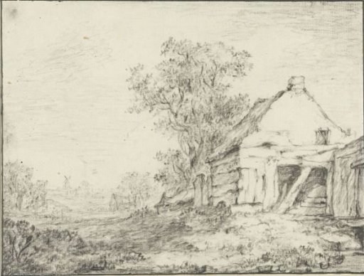 Dilapidated barn by a tree