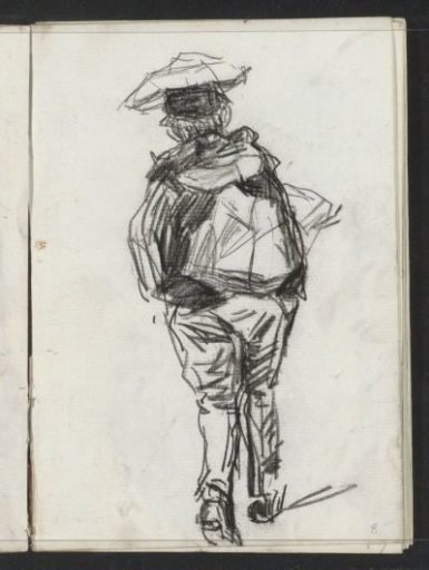 Boy carrying a load, seen from behind