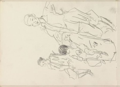 Two seated boys and a standing man