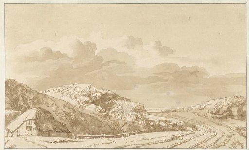 Dune landscape with house and road