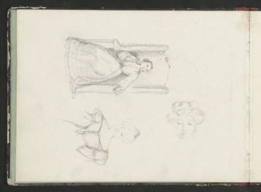 Woman in a long dress seated in an armchair