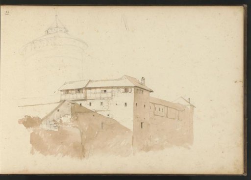 Tower and a building with a half-timbered facade
