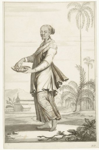 Standing woman with a fruit bowl