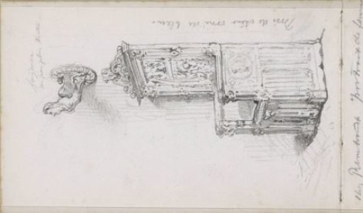 Decorated throne and an ornament, possibly a hook, in the shape of a head