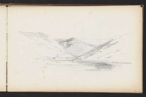 Mountains and a village on the Rhine