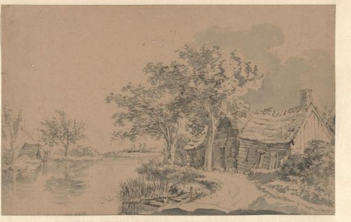 Dilapidated farmhouse in a bend of a river