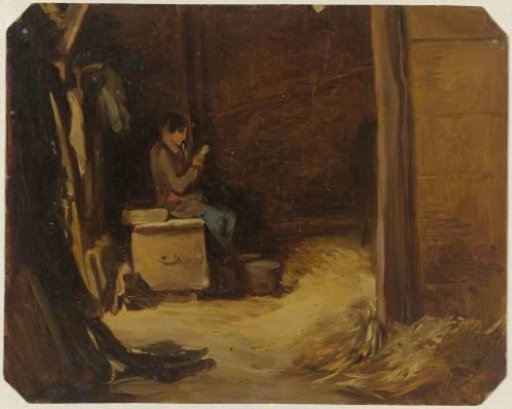 Boy reading letters in a stable