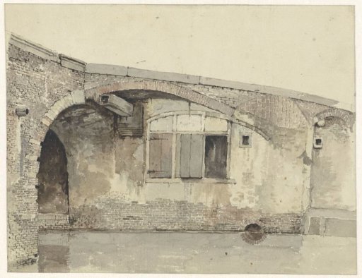Old bridge with dwelling or cellar windows under the quay