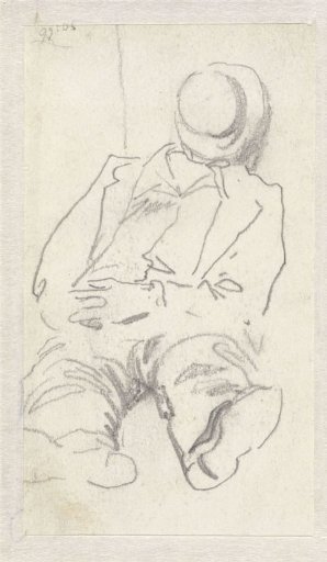 Man sitting on the ground, with hat over face