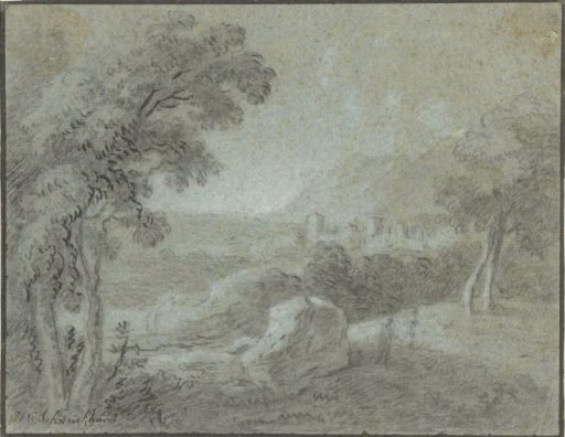 Southern hilly landscape with a city in the distance
