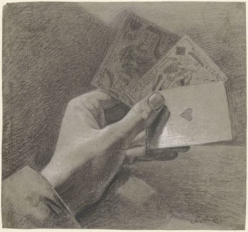 Hand with three playing cards