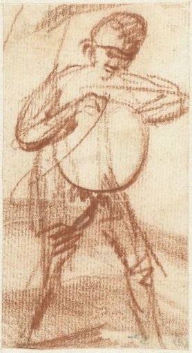 Standing man with a round object