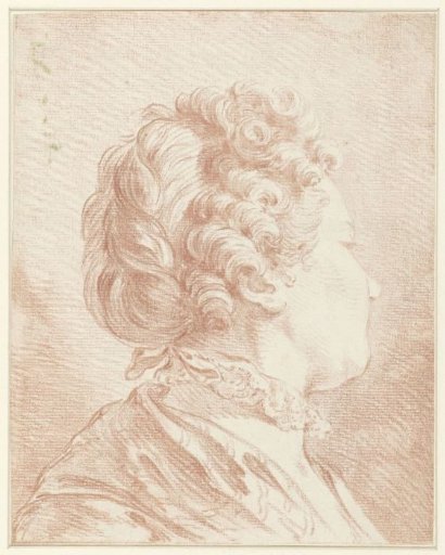 Lady's head facing right with a lace collar