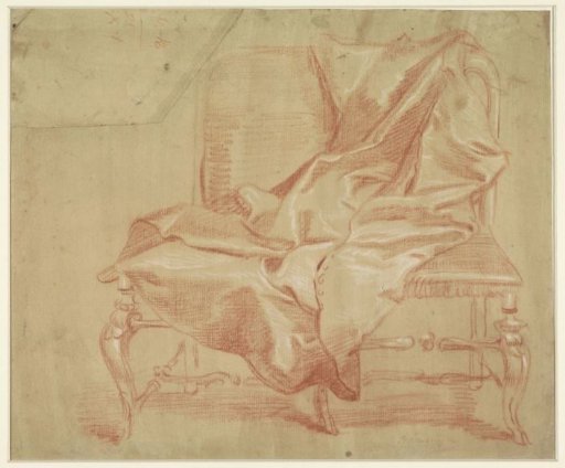 Coat lying on a double armchair