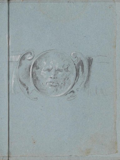 Ornament with a male head