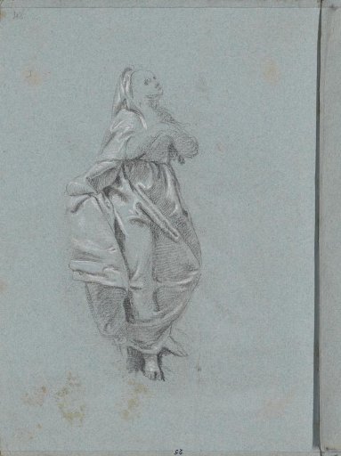 Standing woman in a long cloak