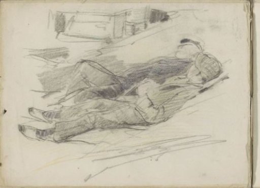 Two men lying on the beach