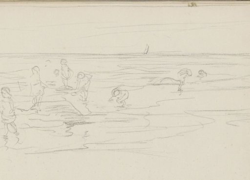 Beach scene with playing children at the high-water mark