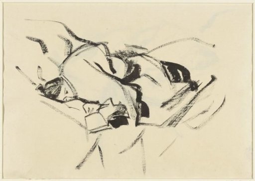 Reclining woman, in cushions, with a book