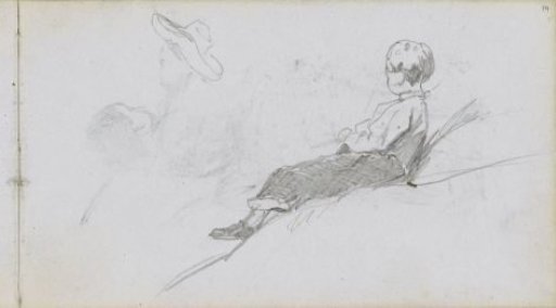 Boy lying on a hill