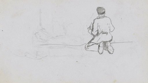 Kneeling man with a cap