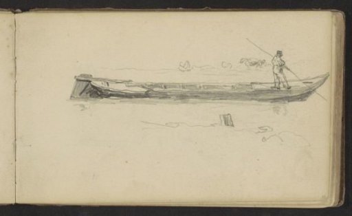 Man with a pole on a barge