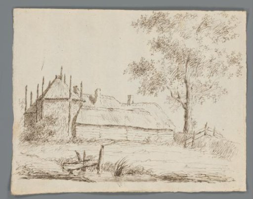 View of a farmhouse with a hay barn