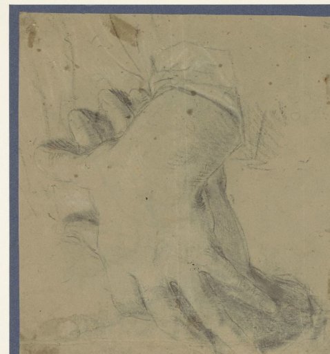 Two men's hands laid over each other