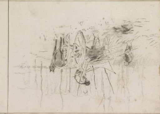 Workers loading brushwood onto a cart